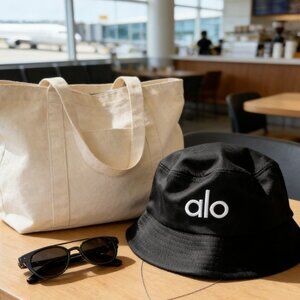 Alo Yoga Black Bucket Hat with White Embroidered Logo